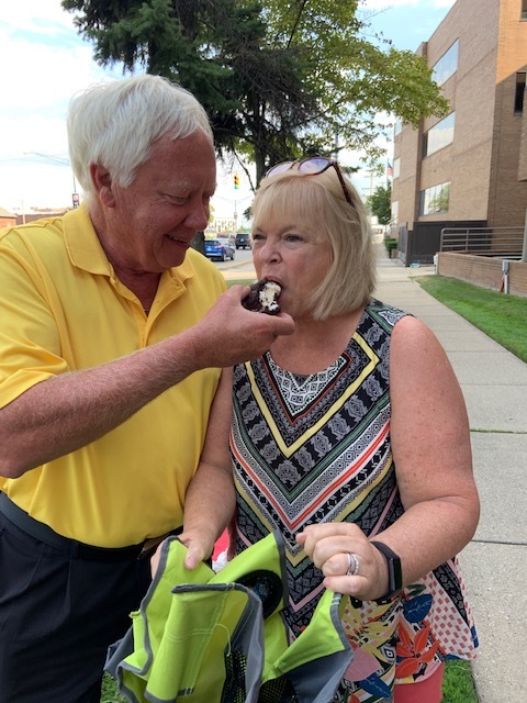 Husband feeding wife ice cream.jpg
